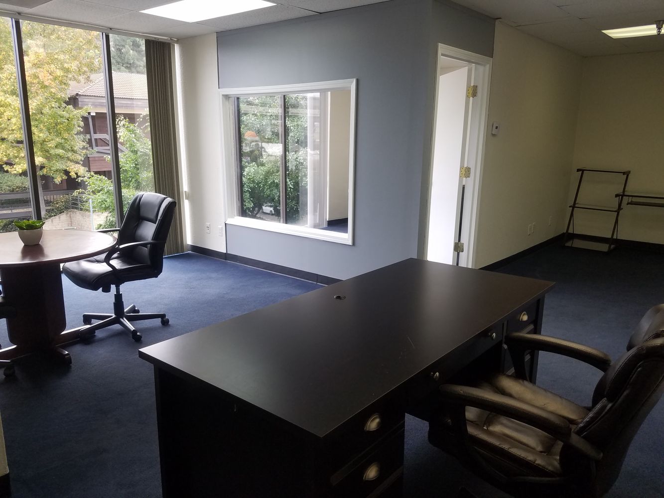 RECEPTION ROOM, 1 PRIVATE OFFICE, OPEN SPACE FOR WORK STATIONS.